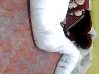 A person is tied up and wrapped like a mummy